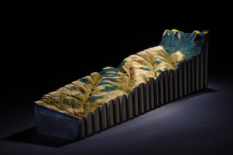 Illustration for article titled This Intricate Landscape Is Carved Into the Encyclopedia Britannica